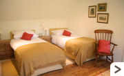 Cottage - Bedroom 3, there is a choice of either a super king-size bed or two single beds.